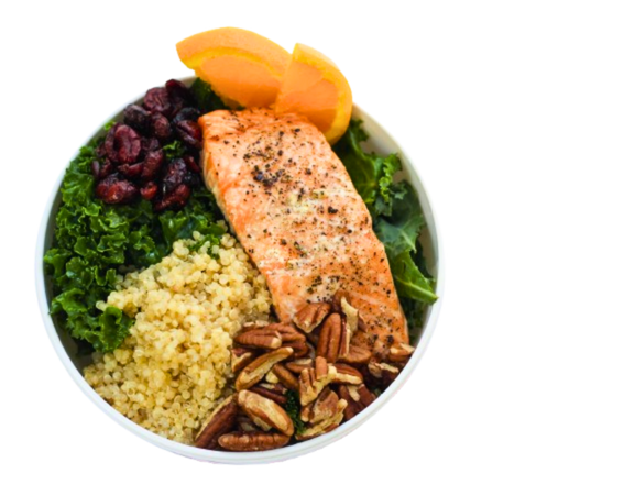 A dish featuring a variety of vibrant, low-glycemic index foods, such as salmon and leafy vegetables.